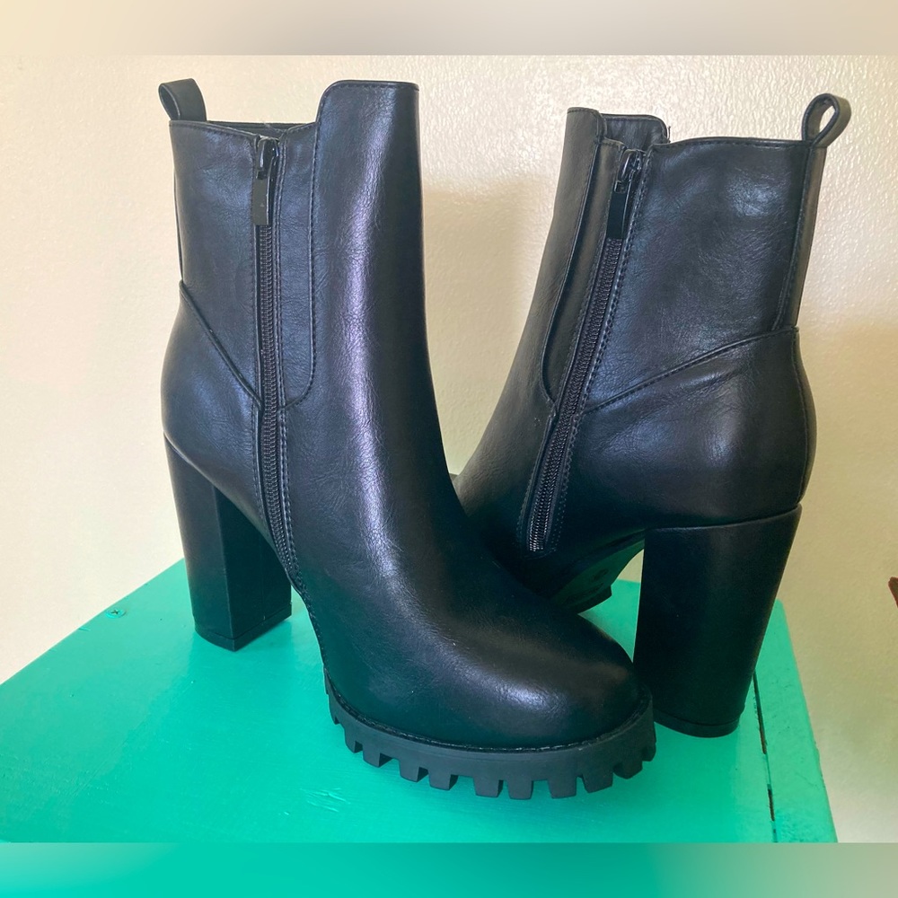 Black booties, with a high heel